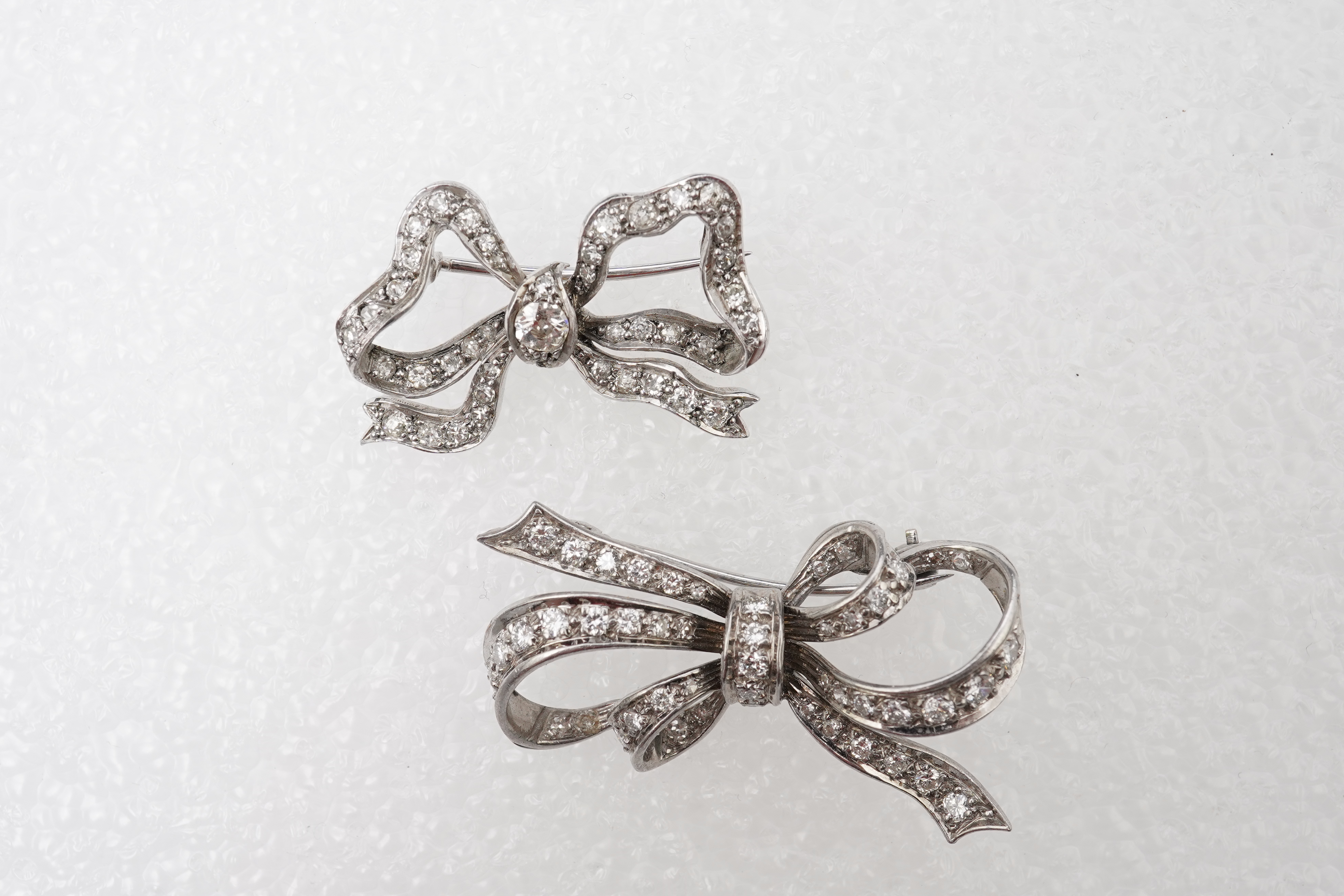 Two diamond brooches, mid 20th century
